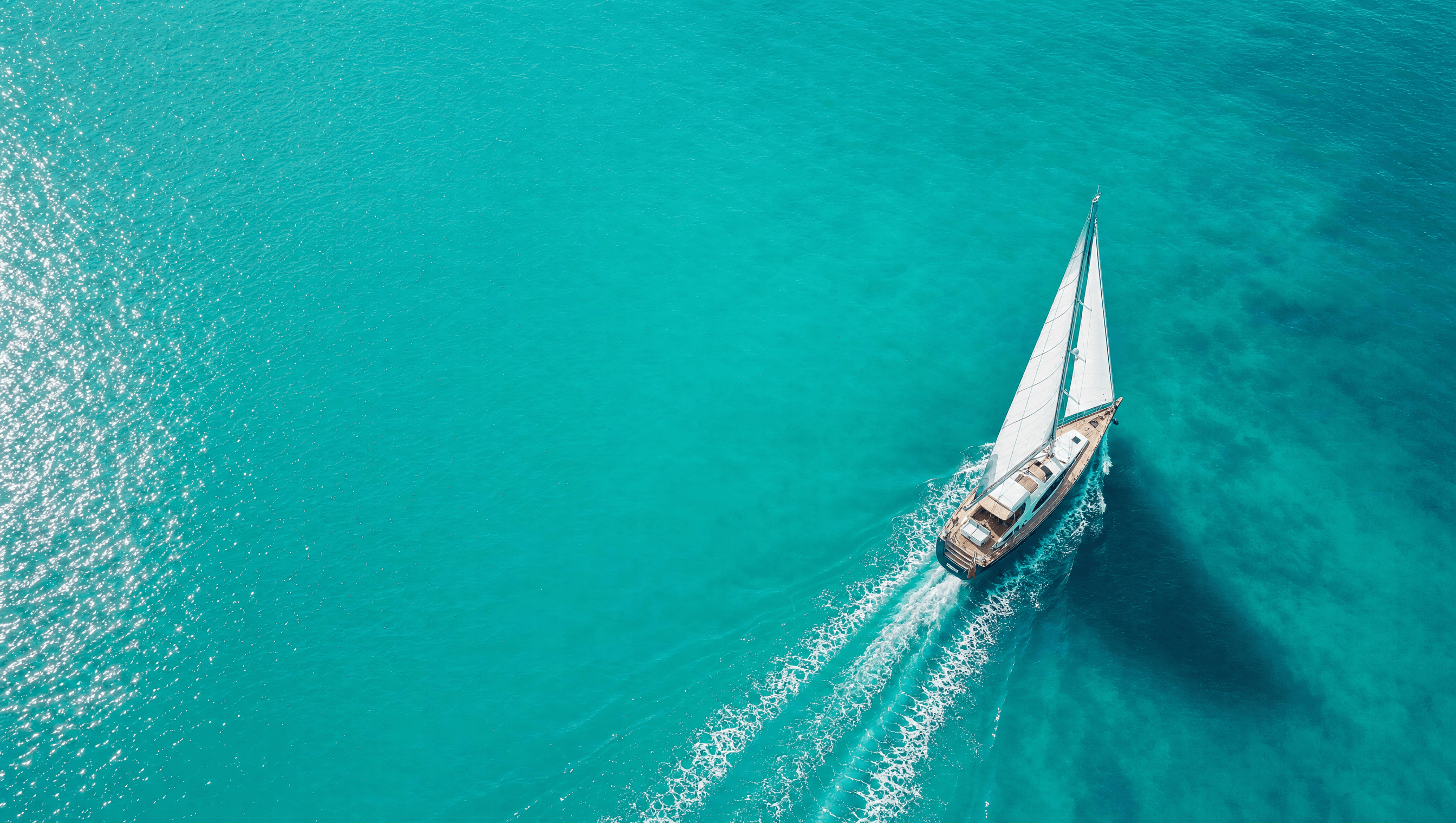 Golden-hour view of a luxury yacht on the Mediterranean